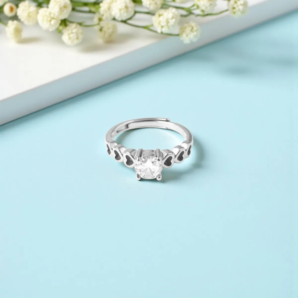 Silver Zircon Ring with Heart Shape Design