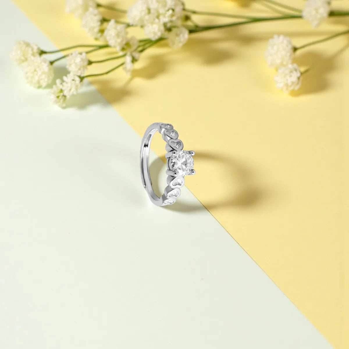 Silver Zircon Ring with Heart Shape Design
